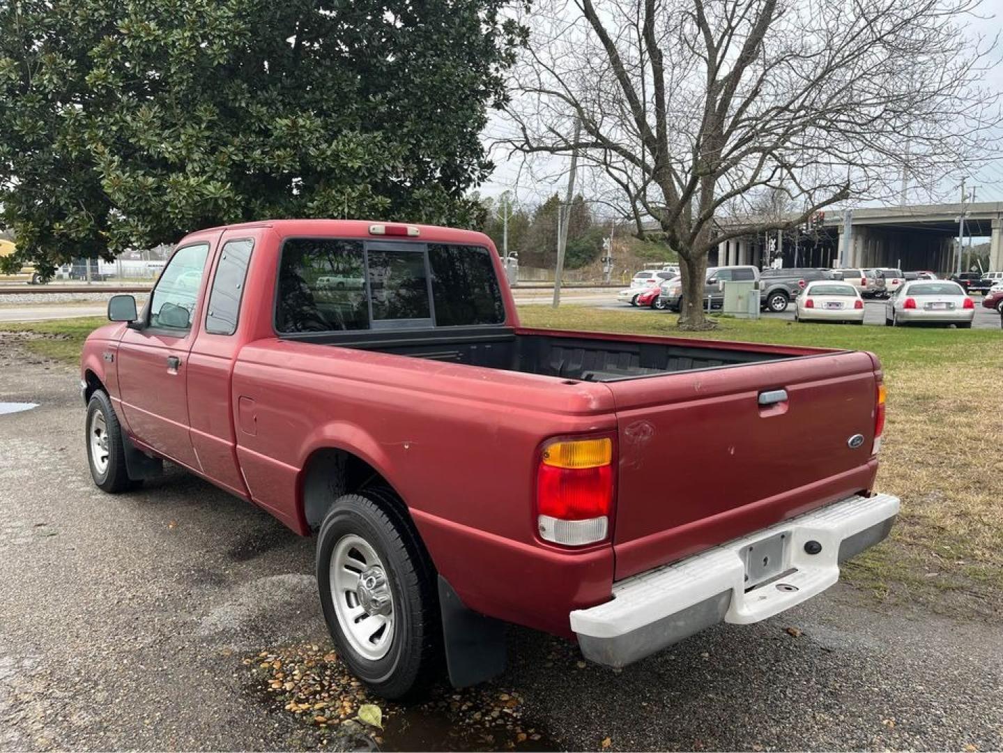 1999 Red /Gray Ford Ranger XL (1FTYR14C9XT) with an 2.5 4 Cylinder engine, 5 Speed Manual transmission, located at 5700 Curlew Drive, Norfolk, VA, 23502, (757) 455-6330, 36.841885, -76.209412 - -1999 Ford Ranger 5 Speed Manual 146k -2.5 4 cylinder extended cab -Runs and drives great -Clearcoat faded on front and hood -New state inspection -Ready for a new owner -VADLR - Photo#5